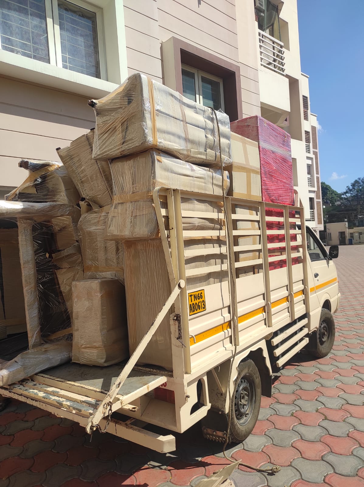 Couple unloading truck
